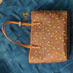 Michael Kors jet set medium carryall tote with airplane design